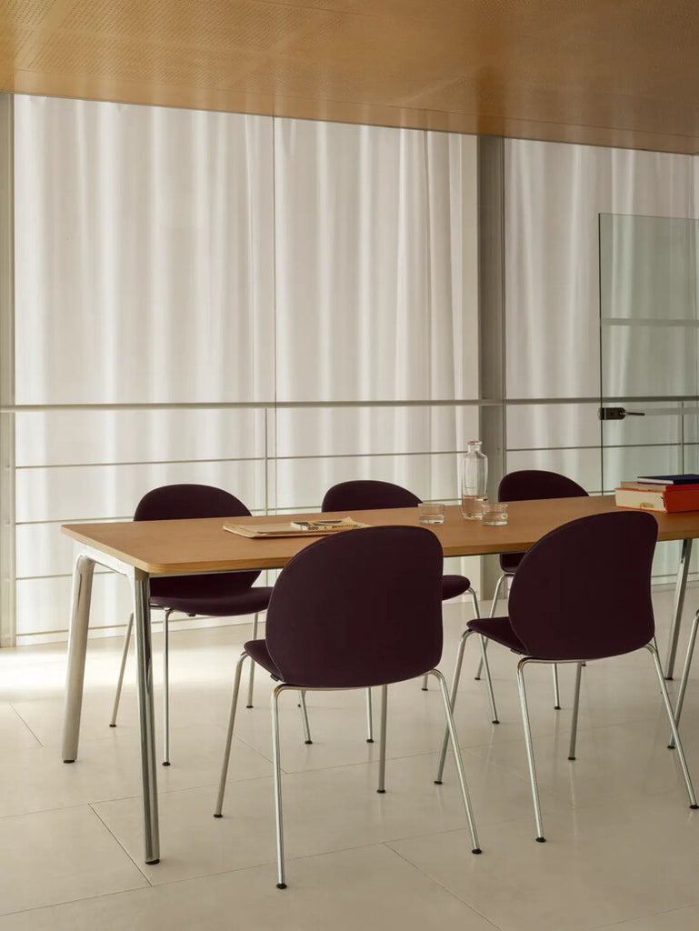 Pluralis Table, Long in a room setting